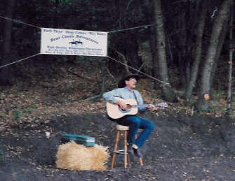 George is picking and singing for your chuck wagon entertainment.